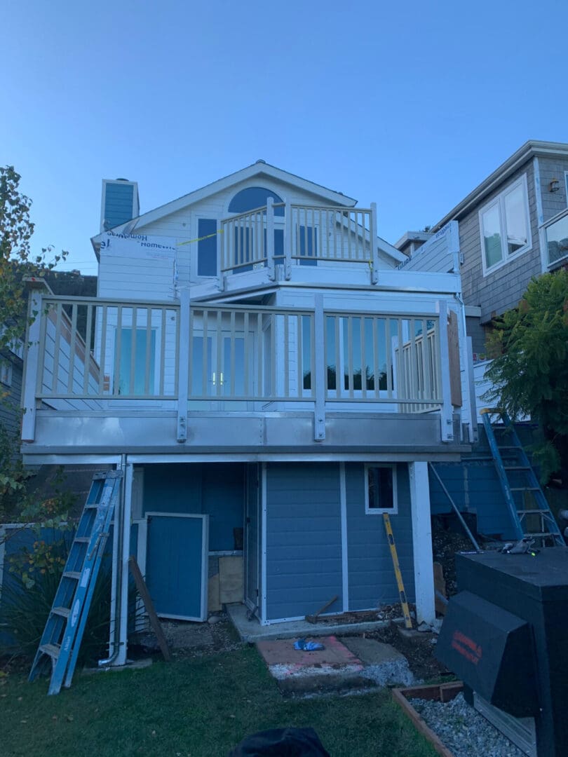 A house with blue siding and white trim.